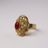 ANELLO ROMBO INTRECCIATO CON CORALLO