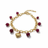 BRACCIALE CON PIETRE ROSSE E CIONDOLO A CUORE DORATO